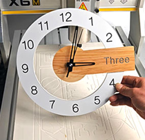 X6M desktop CNC machine machining clock parts from hardwood and engineering plastic