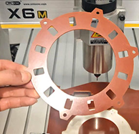 X6M desktop CNC machine milling industrial components from bakelite