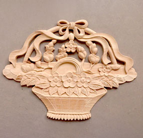 X6M desktop CNC machine carving a wooden food mold in 3D