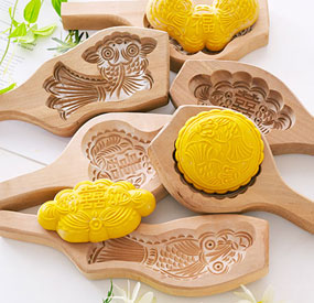 XC-21D compact CNC router engraving a wooden cookie mold